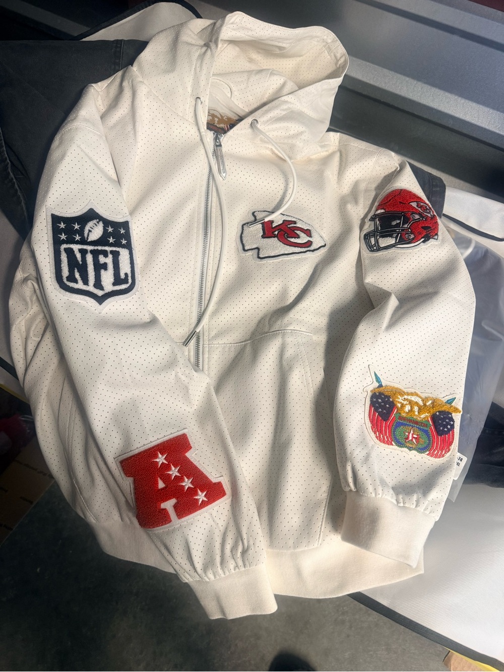 Jeff Hamilton White zip up jacket with NFL & Team Patches